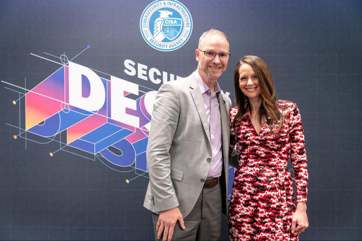 Tenable CSO Bob Huber with CISA Director Jen Easterly during the Secure by Design Pledge signing event at RSA Conference 2024